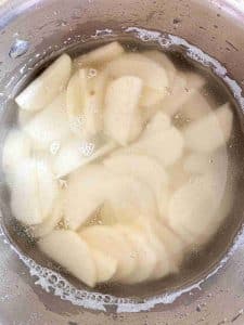 Boiling Peeled and Sliced potato for NYC Diner-Style Home Fries (No Onions) side