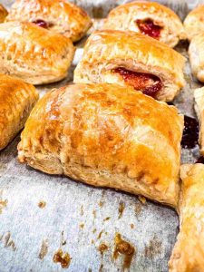 side view on baking sheet 3 Ingredient Cuban Guava Pastries open pastry baked