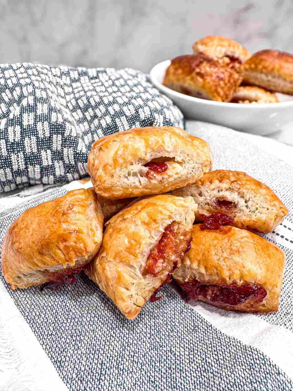 side view of 3 Ingredient Cuban Guava Pastries on a kitchen counter and towel