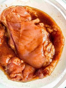 Marinated chicken for Creamy Coconut Milk Chicken Thighs in bowl