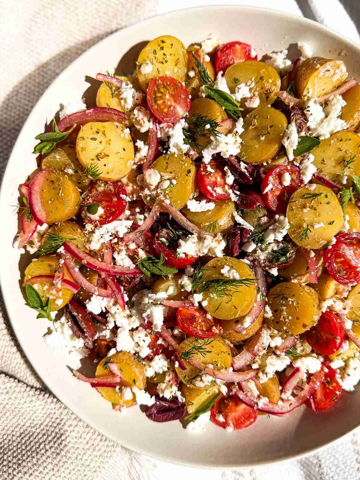overhead view of Greek Potato Salad in a bowl
