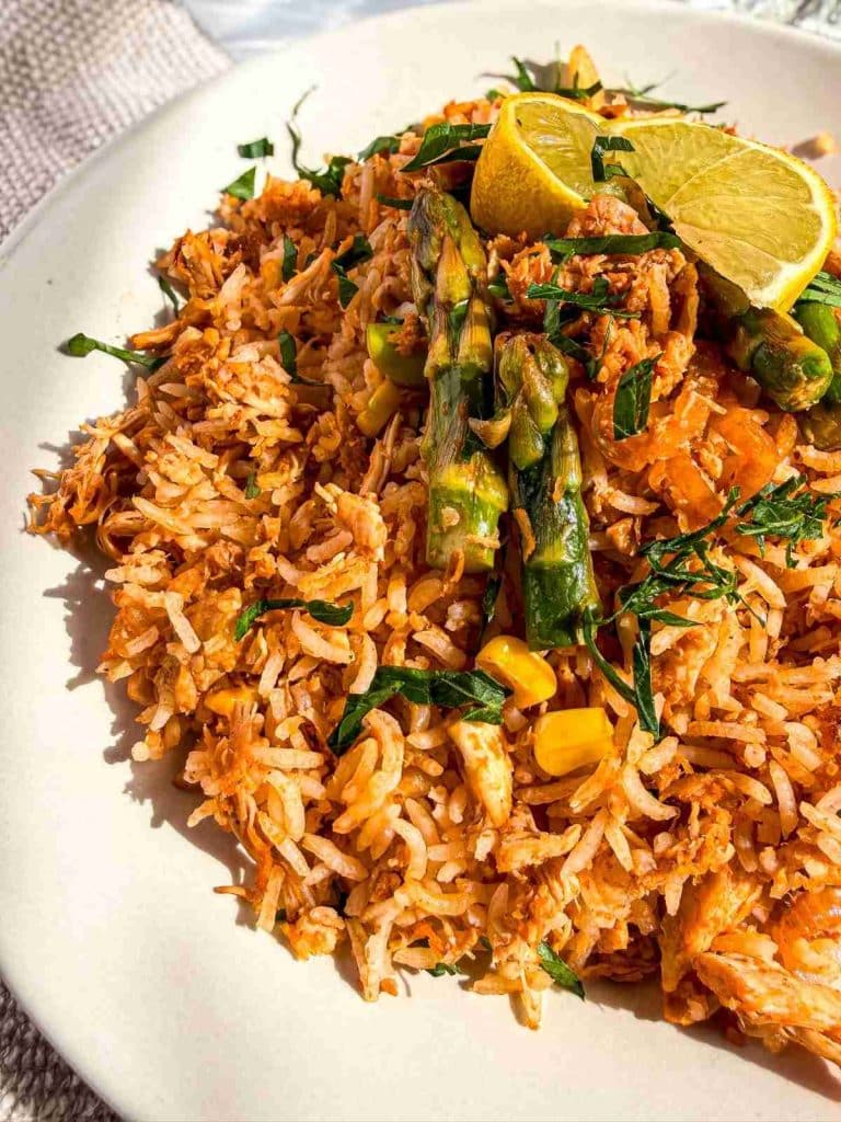 side view of Healthy Leftover Rotisserie Chicken and Rice on a plate