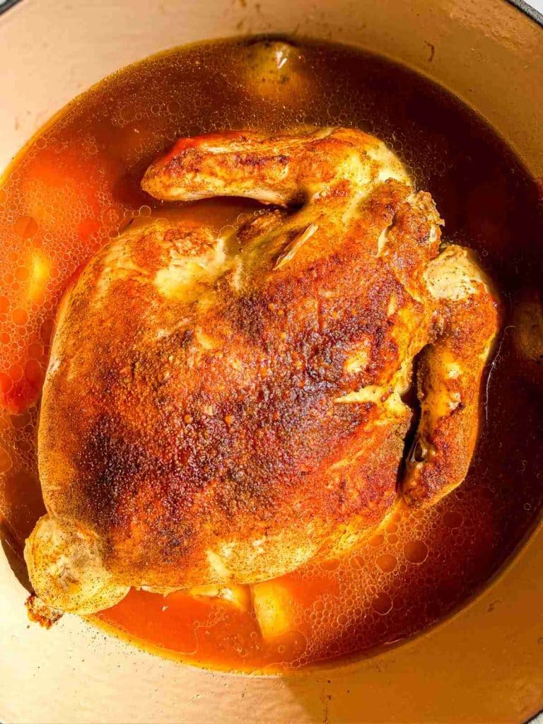 Pot Roast Chicken  with Tomato Broth in dutch oven