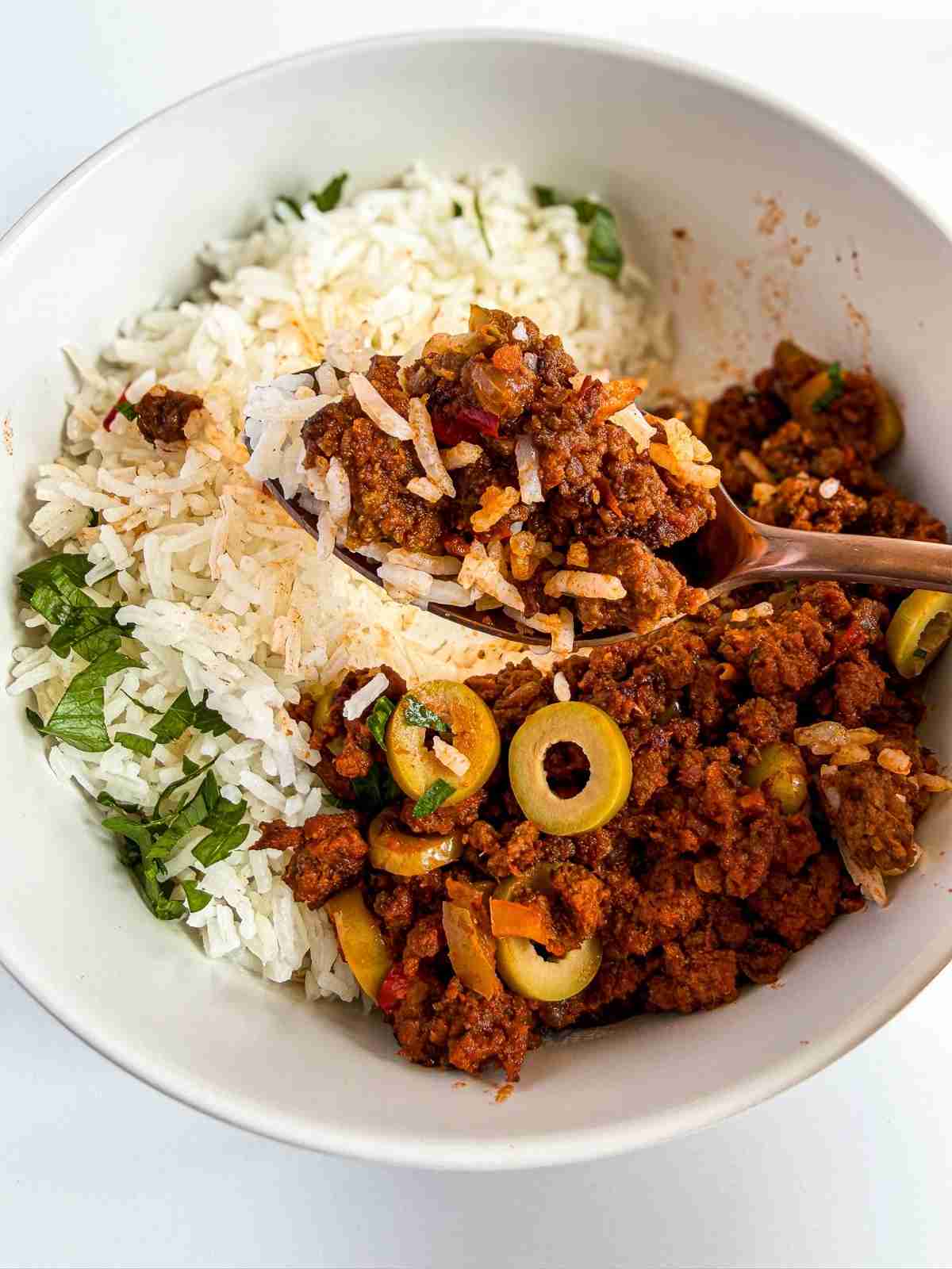 overhead view of Cuban Beef Picadillo rice bowl