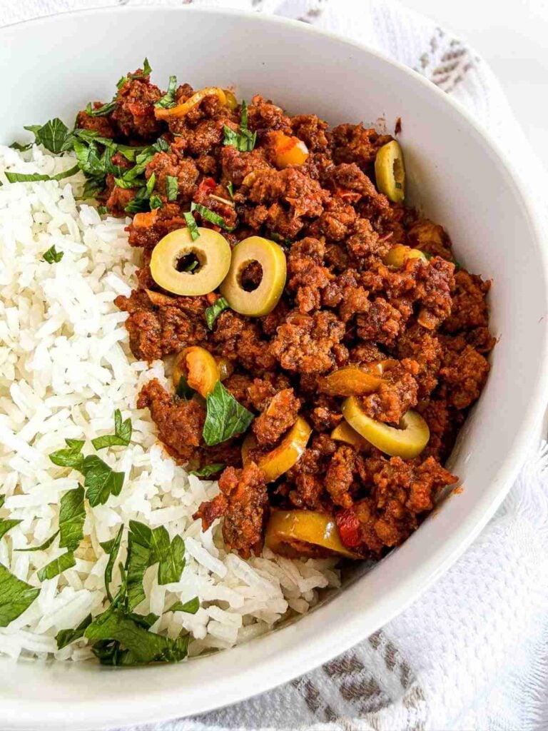 overhead view of Cuban Beef Picadillo rice bowl