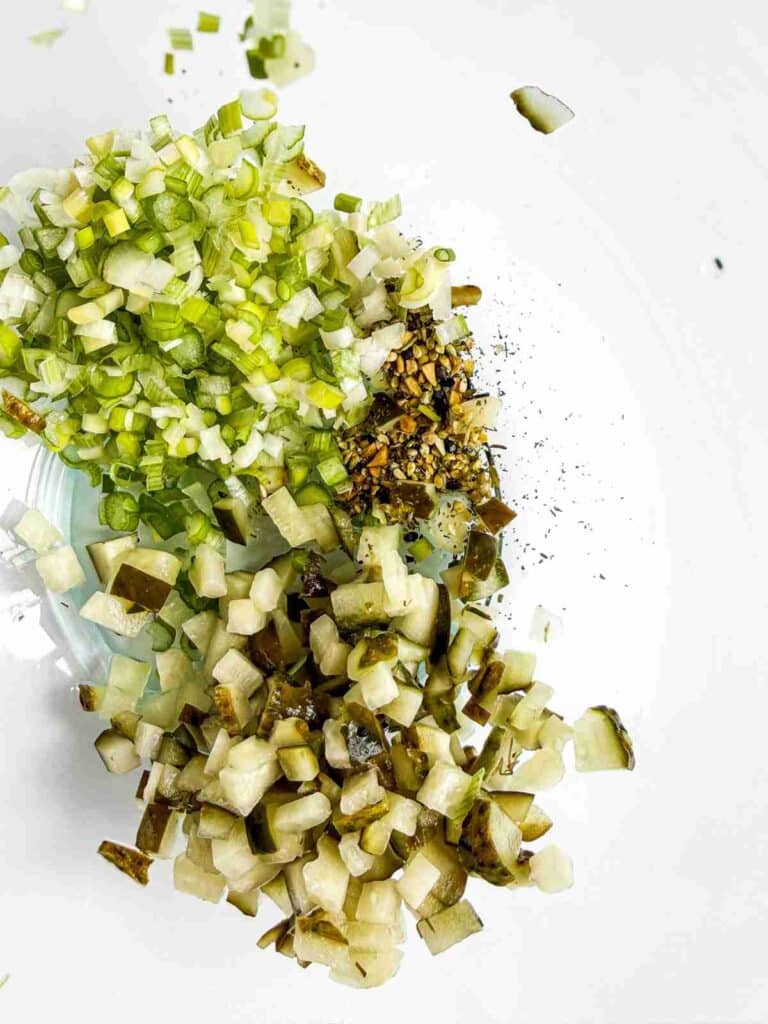 chopped pickles and scallions for high protein dill pickle chicken salad