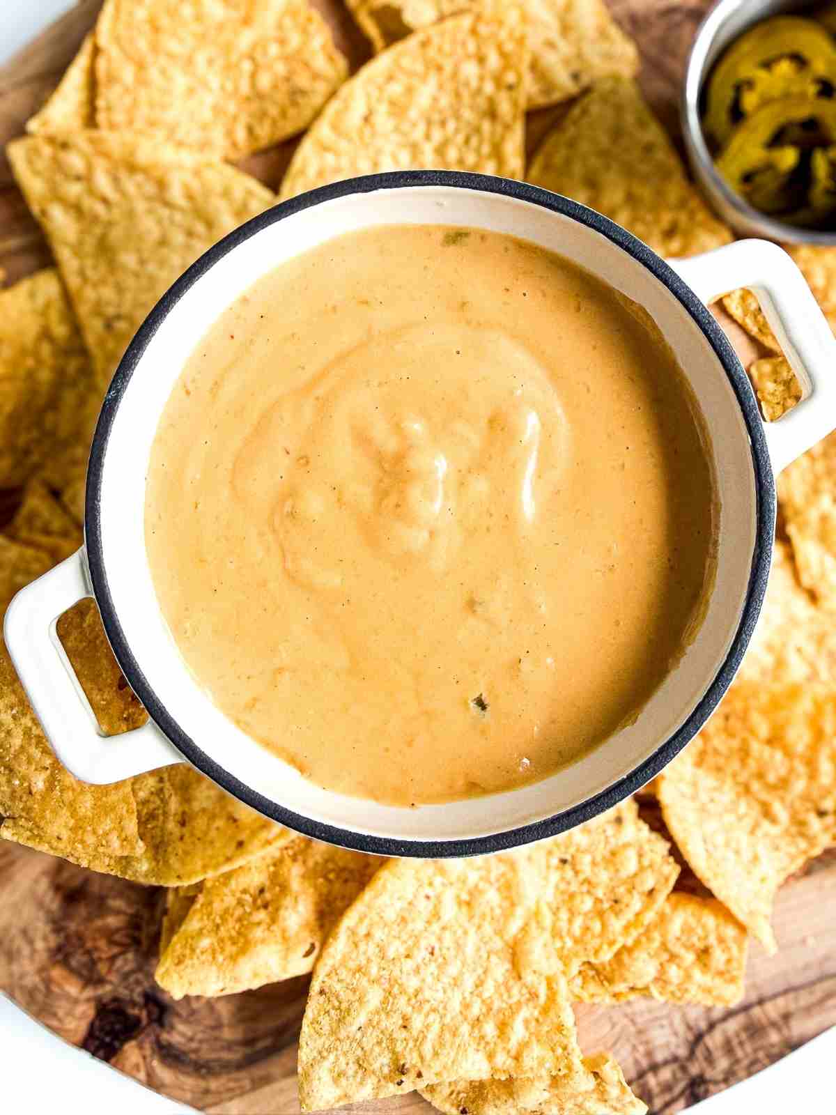 overhead view of Homemade Nacho Cheese Sauce in a mini dutch oven