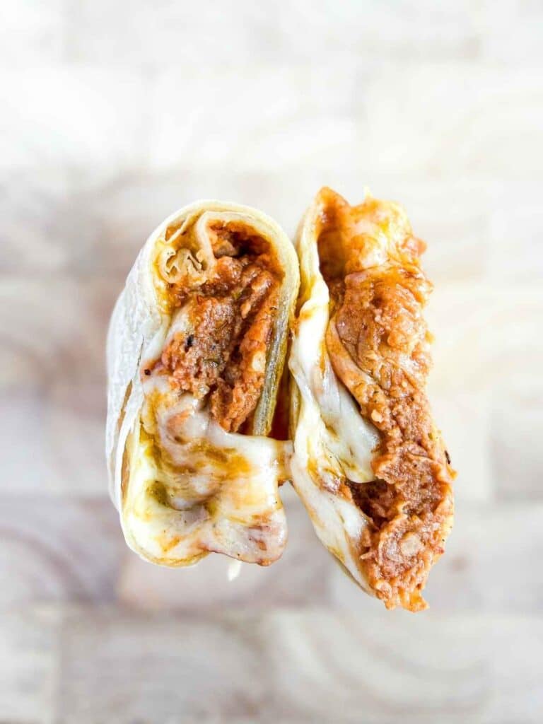 overhead view of Bean and Cheese Burritos With Pickled Jalapeno