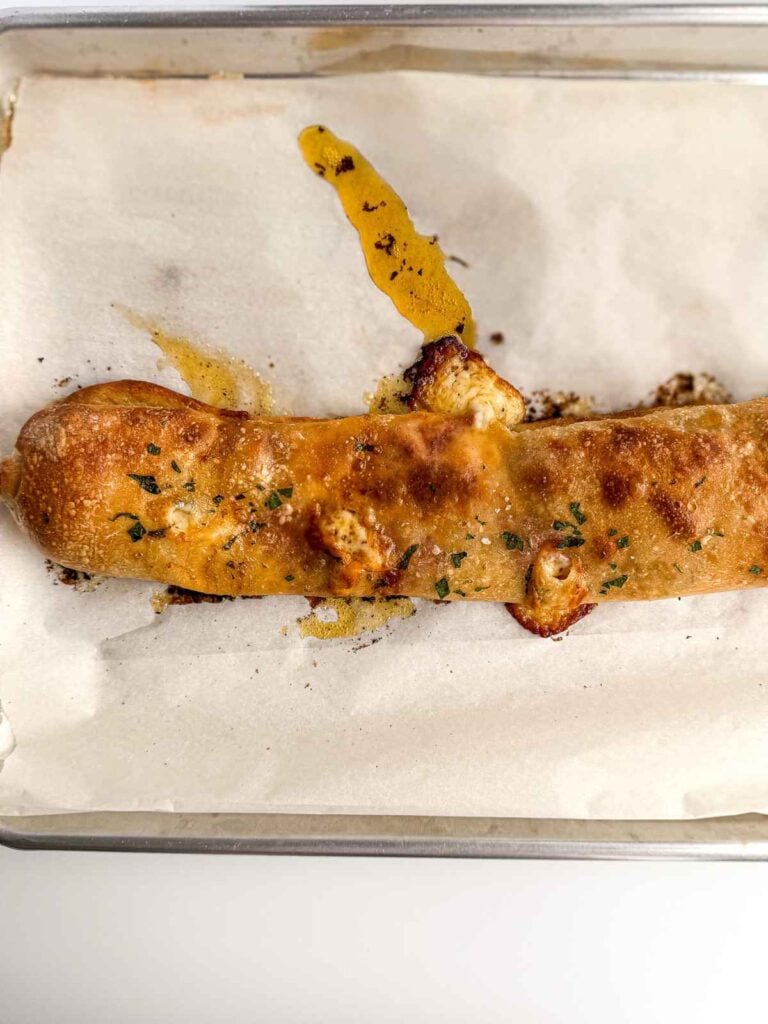 baked golden brown pepperoni stromboli
